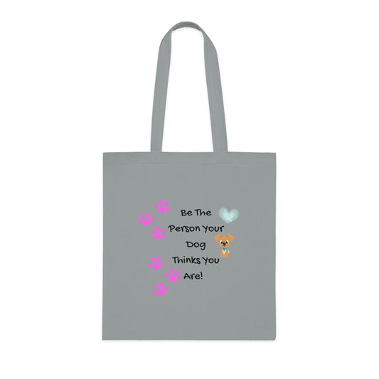 Gray tote bag with paw prints, a heart, and text on a white background