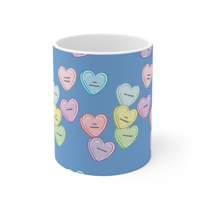 Mug with colorful heart pattern on a blue background