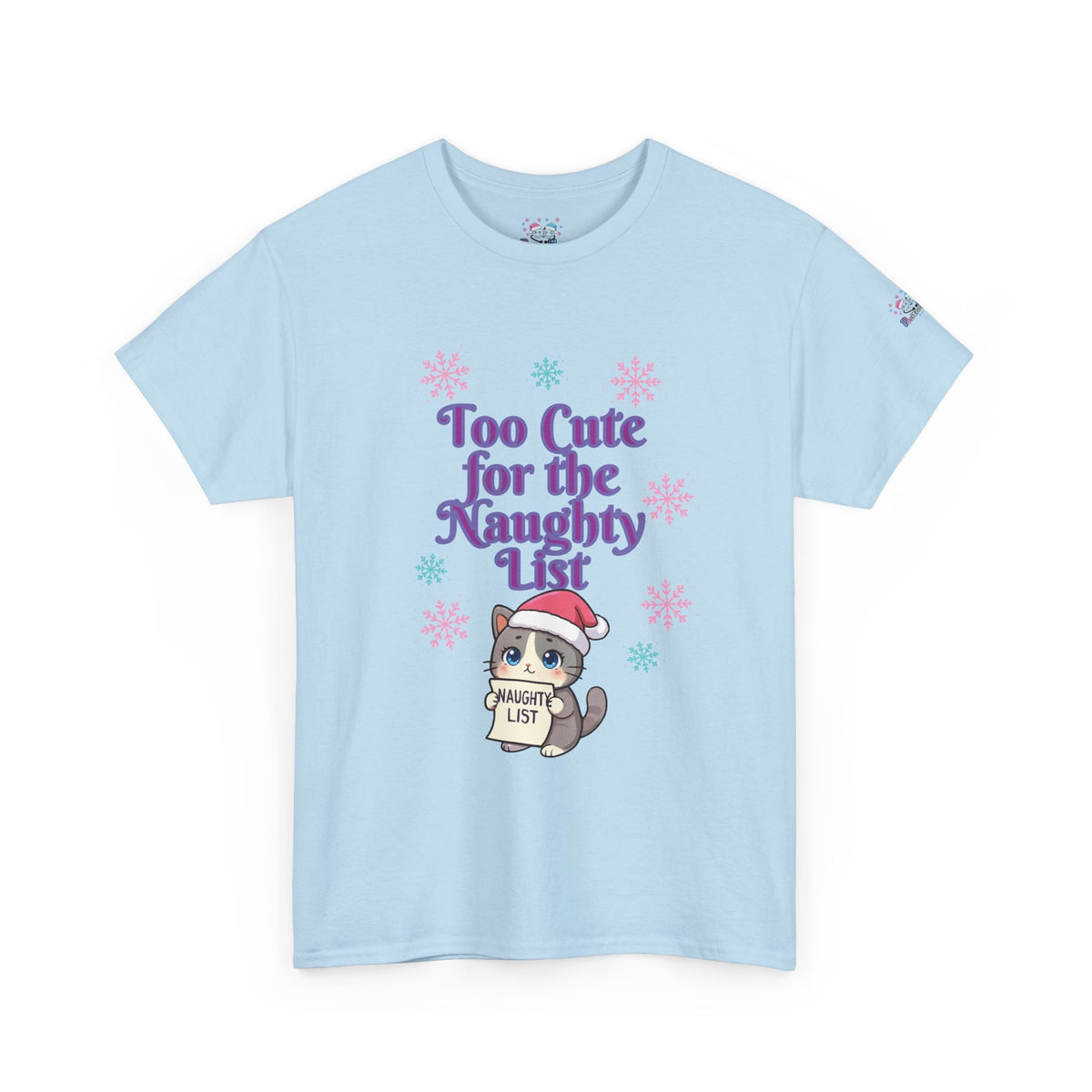 A light blue short-sleeve crewneck t-shirt featuring a festive graphic on the front. The graphic displays the purple text 'Too Cute for the Naughty List' above a cute cartoon cat wearing a Santa hat and holding a 'NAUGHTY LIST' sign, surrounded by pink and blue snowflakes.
