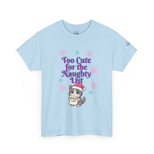 A light blue short-sleeve crewneck t-shirt featuring a festive graphic on the front. The graphic displays the purple text 'Too Cute for the Naughty List' above a cute cartoon cat wearing a Santa hat and holding a 'NAUGHTY LIST' sign, surrounded by pink and blue snowflakes.