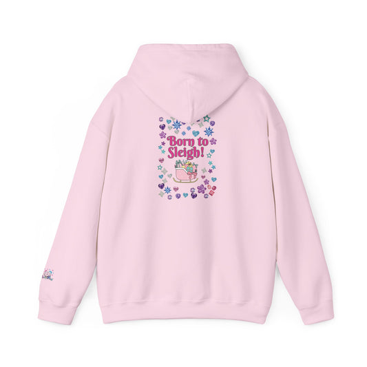 A light pink hoodie shown from the back, featuring a colorful graphic print with the text 'Born to Sleigh!' surrounded by hearts and a pink sleigh illustration.