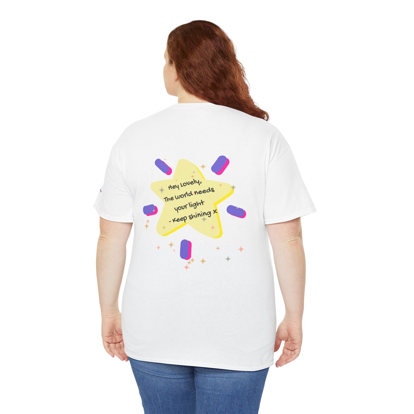 Person wearing a white t-shirt with a colorful star design on the back, standing against a white background.