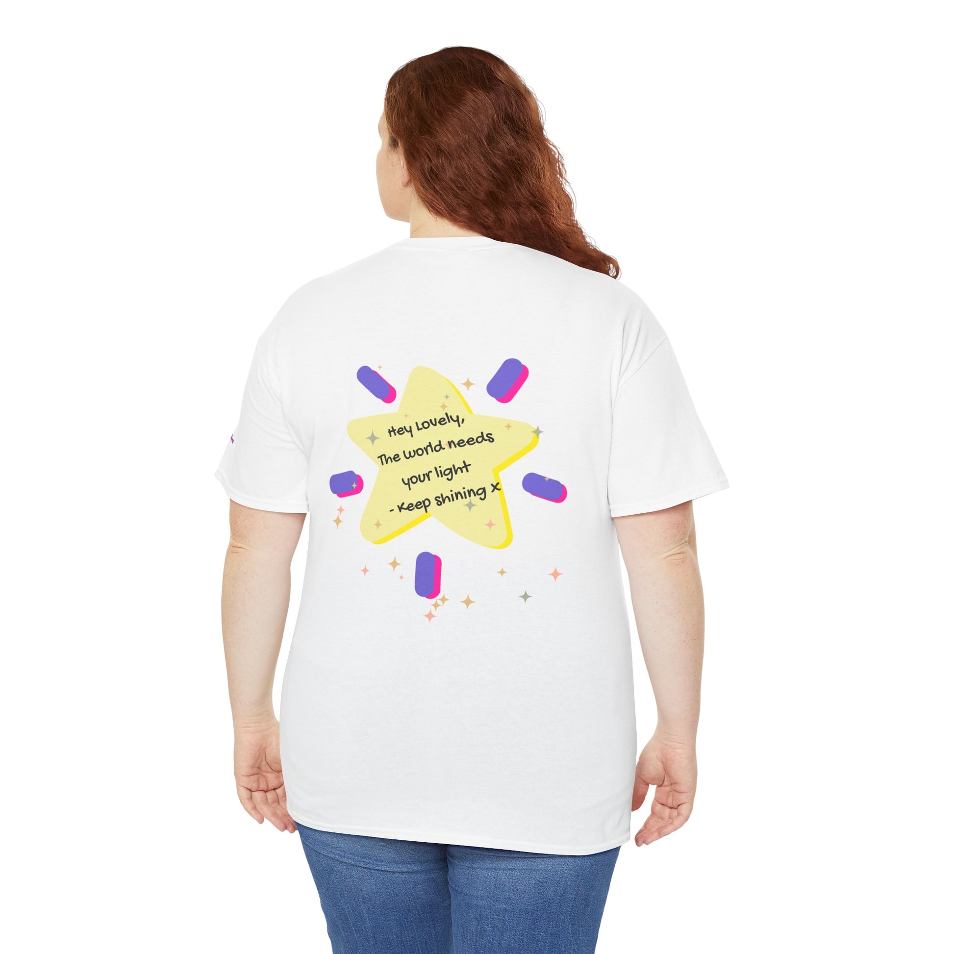 Person wearing a white t-shirt with a colorful star design on the back, standing against a white background.