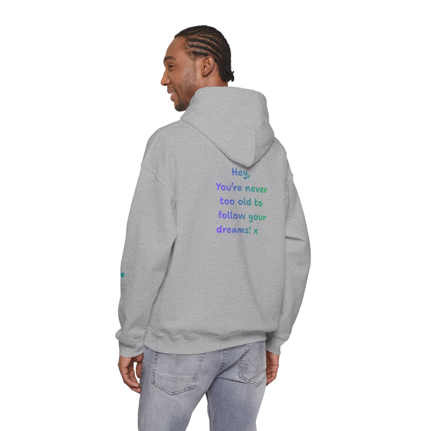 'Hey, You're never to old to follow your dreams! 'x  Unisex Hooded Sweatshirt by PositiveHug - Design on back