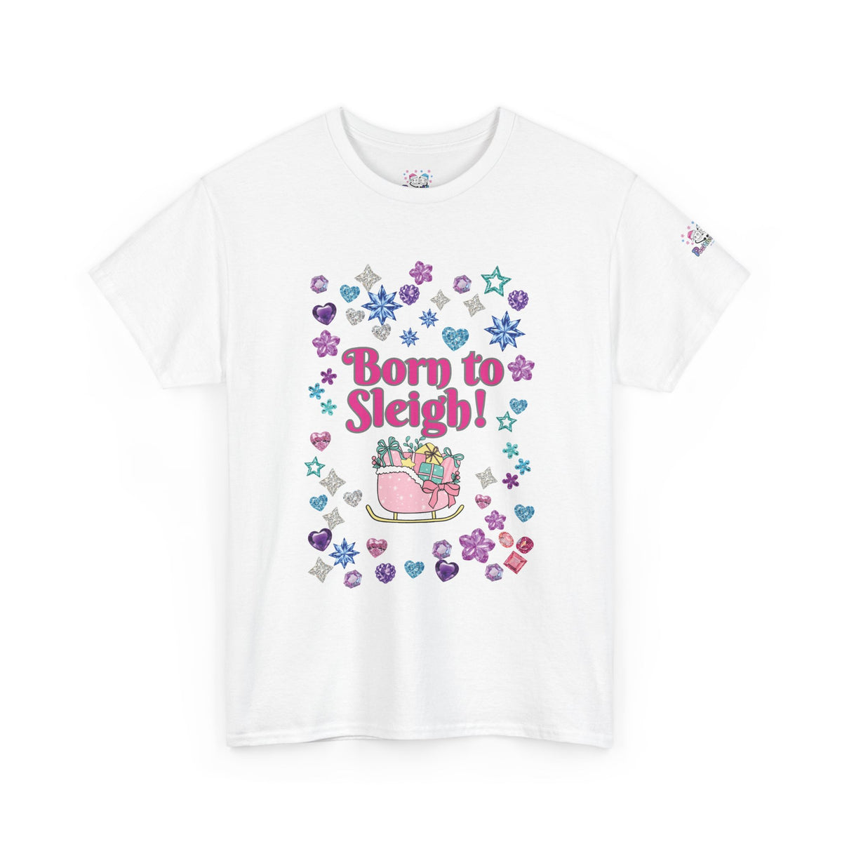 A white short-sleeve crewneck t-shirt featuring a festive Christmas graphic on the front with the text 'Born to Sleigh!' in pink, surrounded by purple and blue glitter-style snowflakes, stars, hearts, and a pink sleigh.