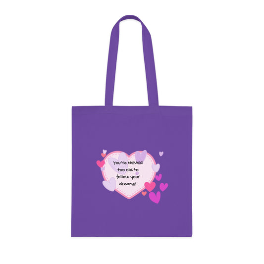 Purple tote bag with a heart-shaped design and text on a white background