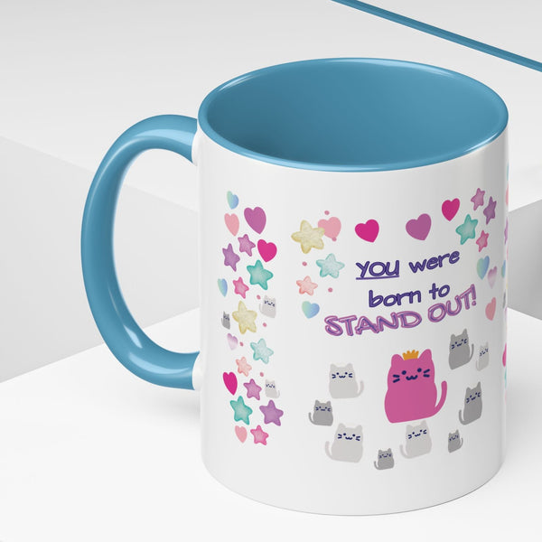 Mug with colorful designs and text on a white background