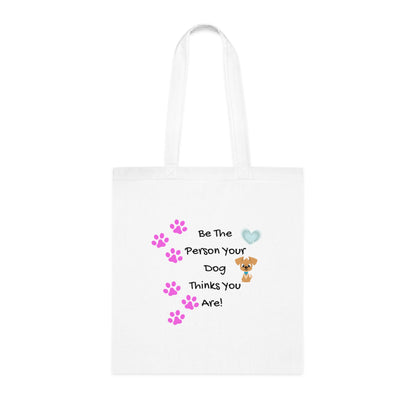 White tote bag with dog-themed text and graphics on a white background