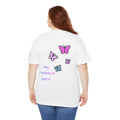 Person wearing a white t-shirt with colorful butterfly designs and text on the back.