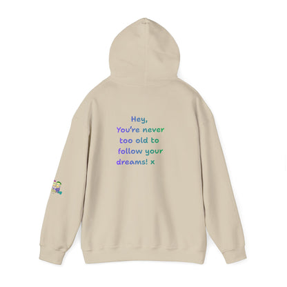 'Hey, You're never to old to follow your dreams! 'x  Unisex Hooded Sweatshirt by PositiveHug - Design on back