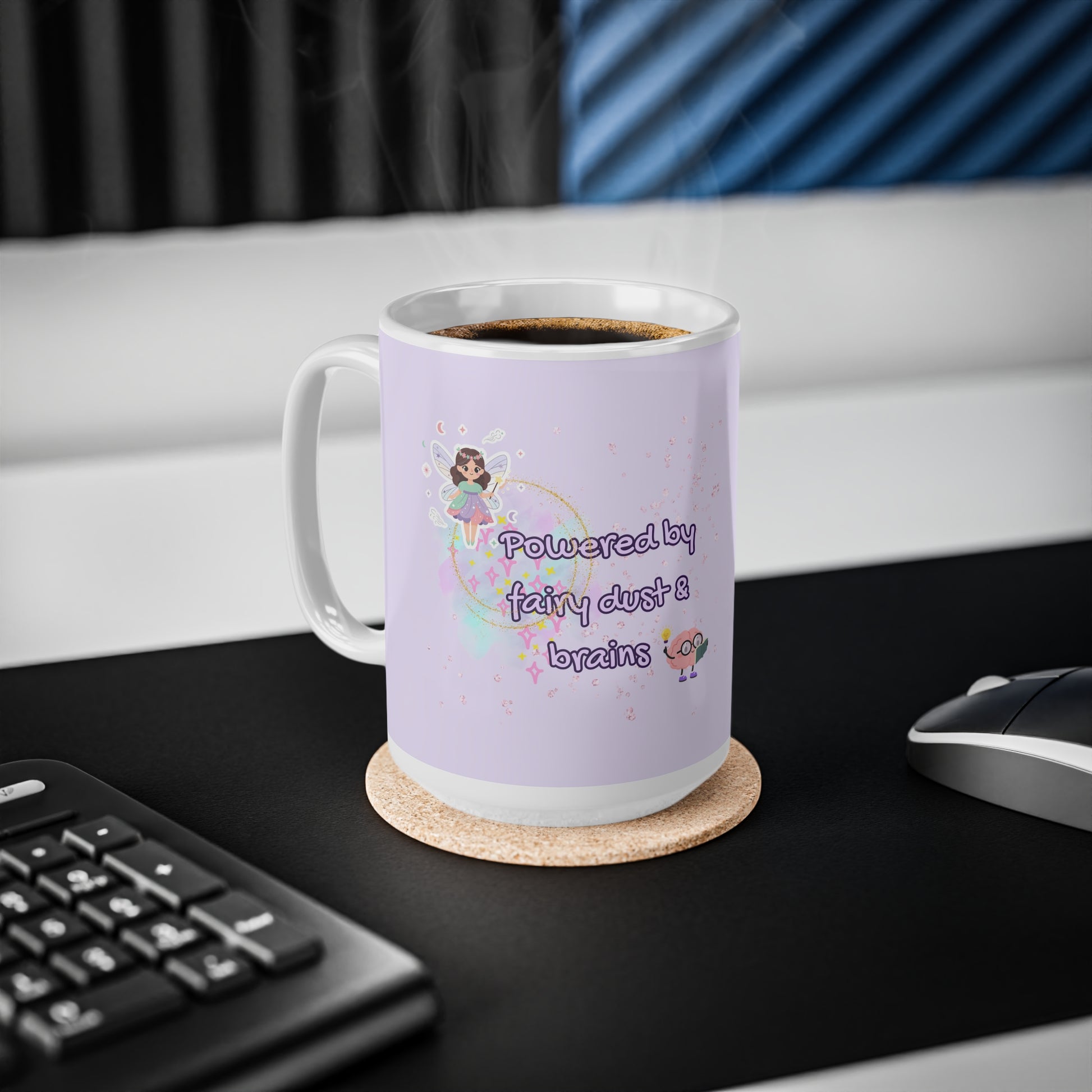 Purple mug with fairy dust and brains text on a desk with a keyboard and mouse.