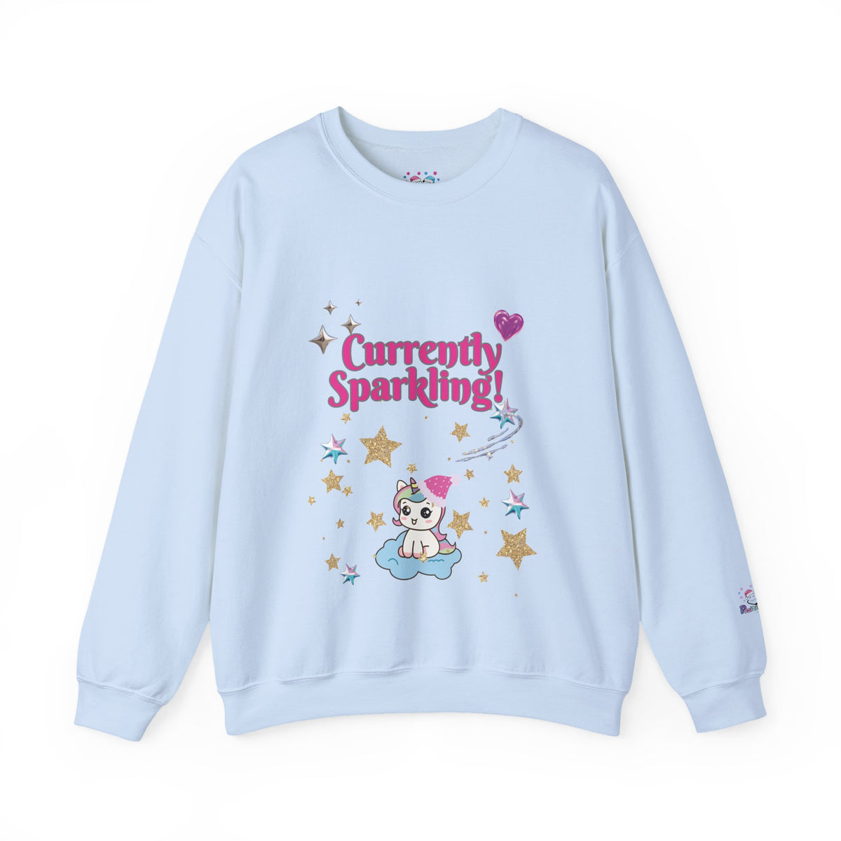 A light blue Christmas crewneck sweatshirt featuring a colorful graphic on the front with the text 'Currently Sparkling!' in pink, a cute cartoon cat on a cloud, and gold stars. 