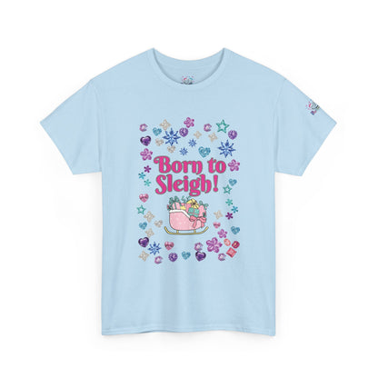 A light blue short-sleeve t-shirt with a festive Christmas graphic on the front. The graphic features the text 'Born to Sleigh!' in pink, surrounded by colorful snowflakes, stars, hearts, and a pink sleigh carrying gifts.